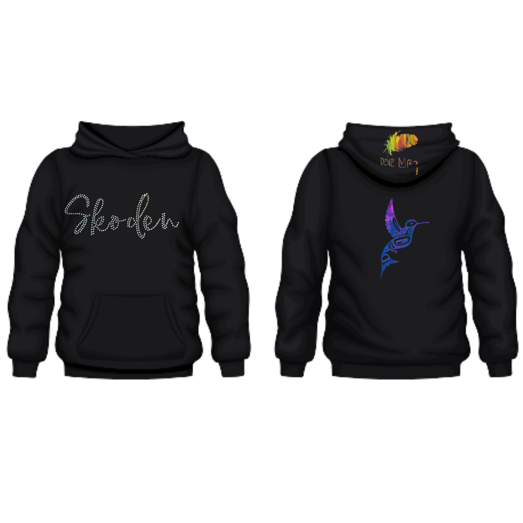 Skoden in Rhinestone Sweater with Haida Hummingbird on the back
